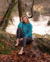 Ladies roll neck jumper – Speckled turquoise – Rossan Knitwear - on model