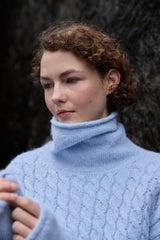 Cabled Funnel Neck Sweater - Forget Me Not - Fisherman Out of Ireland - close up on model 