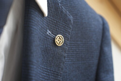 Compass Pin - Brass - Millet Wade - on jacket
