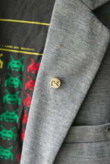 Gamer Pin - Brass - Millet Wade - on jacket