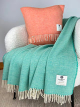 Merino lambswool Throw - Spearmint Herringbone - McNutt - on armchair