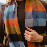 Merino and Cashmere Scarf -Mustard, Orange and Blue Herringbone Block - John Hanly, on model, close up