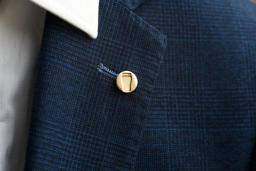 Pint Pin - Brass – Millet Wade - on jacket