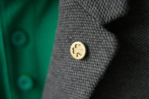Shamrock Pin - Brass – Millet Wade - on jacket